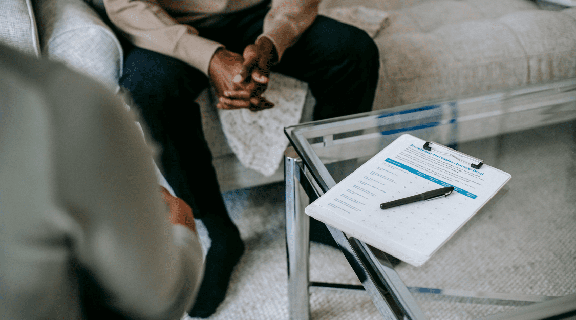 Person choosing the right therapist in NYC by asking important questions during an initial mental health consultation.